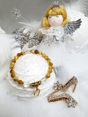 🌟🙏 Très beau bracelet extensible T.standard 18cm. Perles en véritable Œil de Tigre  Gold 🐯 et Cristal de roche. Création artisanale. Modèle unique.