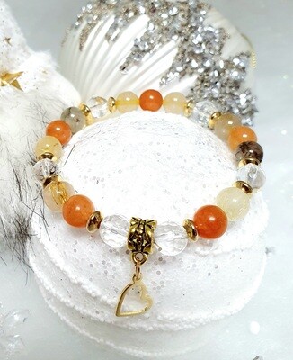 🙏 FORCE/VITALITÉ/ÉQUILIBRE 🙏 Superbe bracelet extensible Taille 19cm Perles en véritables Quartz Rutile lisses et Cristal de Roche facettées. Création artisanale.